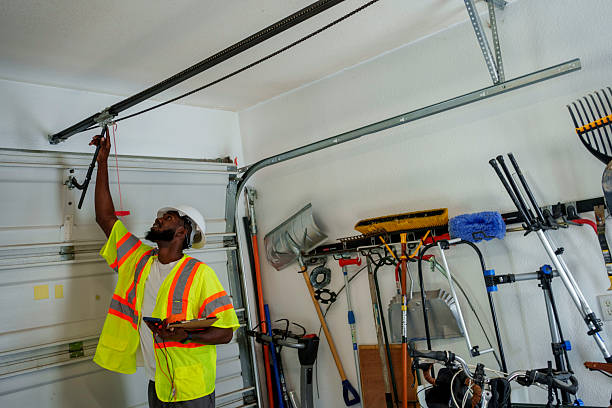Professional Garage Door Roller Replacement technician working in Barneveld, WI